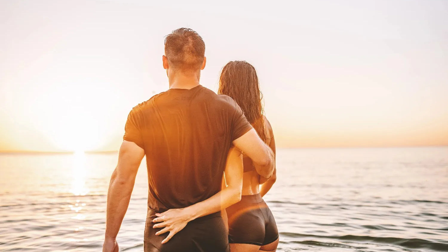 woman and man in the sea