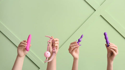 women holding sex toys