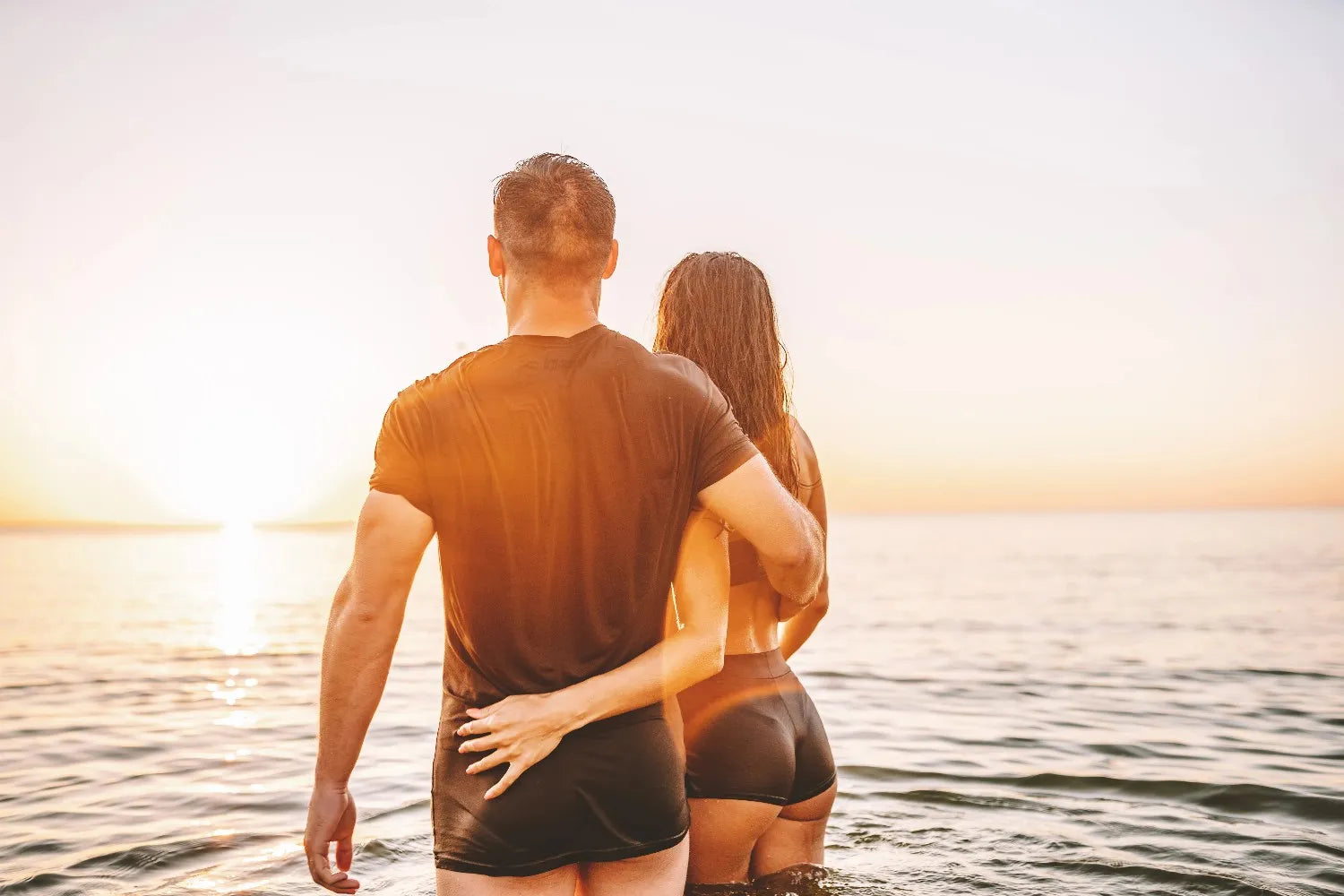 woman and man in the sea