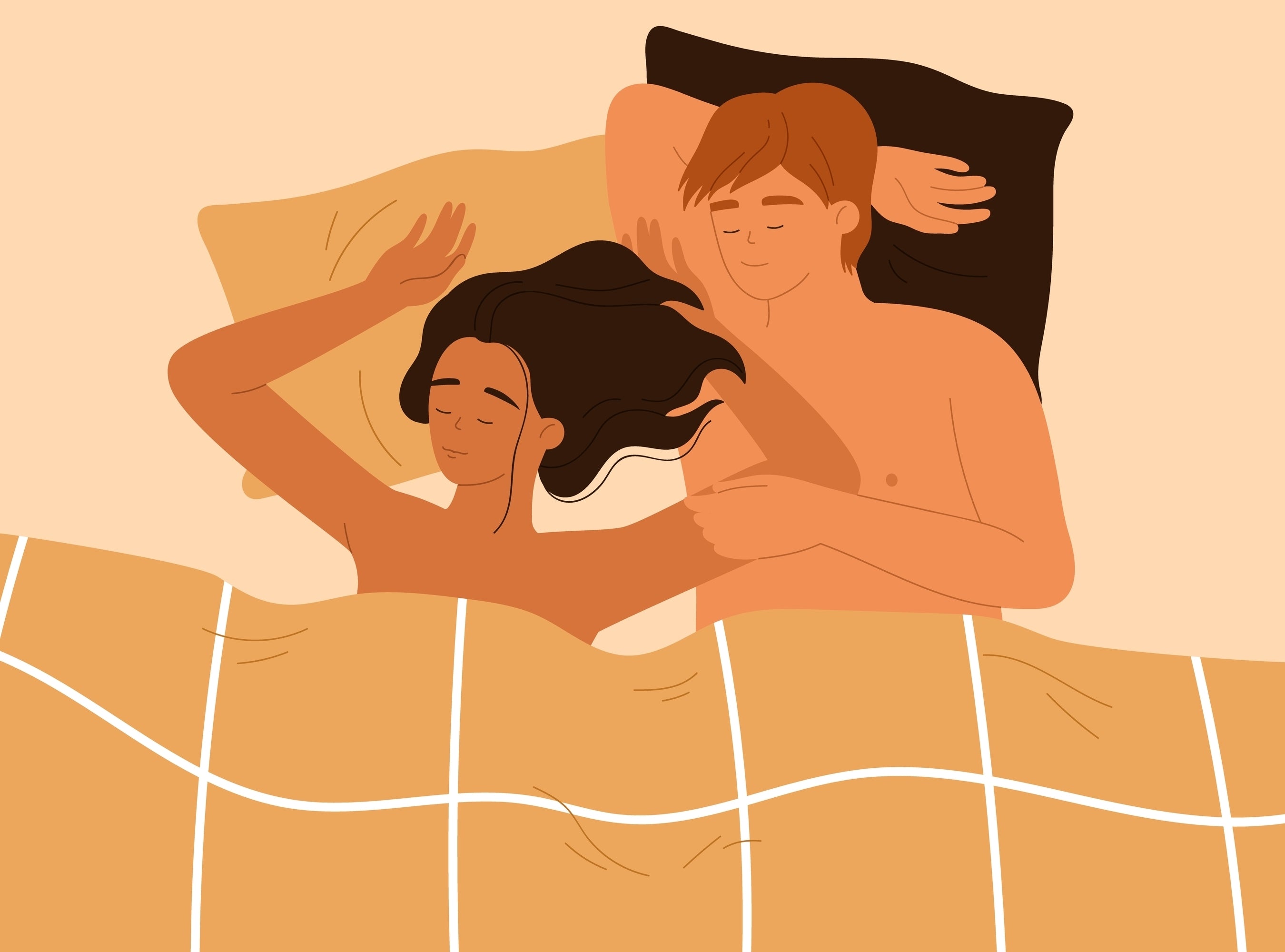 man and women holding each other in bed