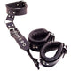 Black Leather Restraints for Neck to Wrist by Rouge Garments.